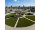 Circular fountain with landscaping at 9194 Sommerset Hills Dr, Davenport, FL 33896