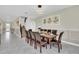 Formal dining room with large table and seating for ten at 9194 Sommerset Hills Dr, Davenport, FL 33896