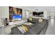 L shaped sectional and large screen TV in living room at 9194 Sommerset Hills Dr, Davenport, FL 33896