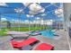 Inviting pool area with spa, lounge chairs, and a hammock at 9194 Sommerset Hills Dr, Davenport, FL 33896