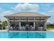 Pool bar with seating and outdoor space at 9194 Sommerset Hills Dr, Davenport, FL 33896