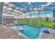 Enjoy this refreshing pool with a fun inflatable and basketball hoop at 9194 Sommerset Hills Dr, Davenport, FL 33896