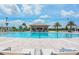 Resort-style pool with a swim-up bar and lounge chairs at 9194 Sommerset Hills Dr, Davenport, FL 33896
