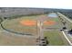 Aerial view of two baseball fields with surrounding walking paths at 9505 Luna Dr, St Cloud, FL 34773