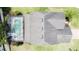House with pool and screened enclosure seen from above at 993 Suffolk Pl, Davenport, FL 33896