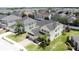 Two-story house with palm trees and neighborhood view at 993 Suffolk Pl, Davenport, FL 33896