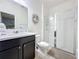 Modern bathroom with walk-in shower at 993 Suffolk Pl, Davenport, FL 33896