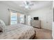 Serene bedroom with pool views at 993 Suffolk Pl, Davenport, FL 33896