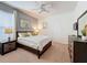 Bright bedroom with a comfortable bed and plenty of closet space at 993 Suffolk Pl, Davenport, FL 33896