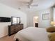 Cozy bedroom with ensuite bathroom access at 993 Suffolk Pl, Davenport, FL 33896
