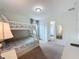Bedroom with bunk beds, a dresser and window at 993 Suffolk Pl, Davenport, FL 33896