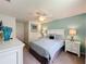 Relaxing bedroom with ceiling fan and neutral decor at 993 Suffolk Pl, Davenport, FL 33896