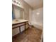 Clean bathroom with tub, toilet and vanity at 1051 S Hiawassee Rd # 2112, Orlando, FL 32835