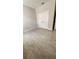 Bedroom with double door closet and tile floors at 115 W Murphy St, Davenport, FL 33837
