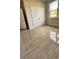 Bright bedroom with double door closet and tile floors at 115 W Murphy St, Davenport, FL 33837