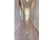 Bright hallway with tile floors leading to other rooms at 115 W Murphy St, Davenport, FL 33837