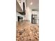 Modern kitchen features granite countertops and stainless steel appliances at 115 W Murphy St, Davenport, FL 33837
