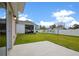 Spacious backyard with patio and screened enclosure at 1274 Fury St, Davenport, FL 33837