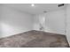 Well-lit bedroom with carpet flooring and en-suite bathroom at 1274 Fury St, Davenport, FL 33837