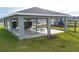Community pavilion with picnic tables, mailboxes, and playground at 1274 Fury St, Davenport, FL 33837