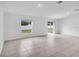 Bright and spacious living room with tile floors and sliding glass doors at 1274 Fury St, Davenport, FL 33837