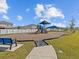 Community playground with shade structures at 1274 Fury St, Davenport, FL 33837