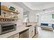 Modern kitchen with quartz countertops and stainless steel appliances at 1308 Grady Ln, Davenport, FL 33896