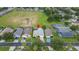 Aerial view of home and neighborhood, showing location and nearby amenities at 135 Langham Dr, Davenport, FL 33897