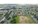 Aerial view showcasing the home's location and surrounding landscape at 135 Langham Dr, Davenport, FL 33897