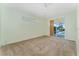 Bright bedroom with sliding doors leading to the pool area at 135 Langham Dr, Davenport, FL 33897