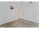 Simple bedroom with neutral walls and carpeted floor at 135 Langham Dr, Davenport, FL 33897