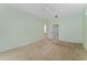 Spacious bedroom with access to bathroom and hallway at 135 Langham Dr, Davenport, FL 33897