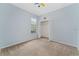 Simple bedroom with neutral walls and carpeted floor at 135 Langham Dr, Davenport, FL 33897