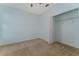 Simple bedroom with carpet flooring and a spacious closet at 135 Langham Dr, Davenport, FL 33897