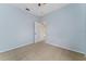 Simple bedroom with neutral walls and carpeted floor at 135 Langham Dr, Davenport, FL 33897