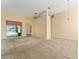 Spacious living room with view of the pool at 135 Langham Dr, Davenport, FL 33897