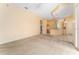 Spacious living room with view into kitchen and breakfast nook at 135 Langham Dr, Davenport, FL 33897