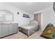 Charming bedroom with a comfortable bed and a dresser at 1481 Discovery St, Davenport, FL 33896