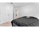 Well-lit bedroom featuring a cozy bed and ample closet space at 1481 Discovery St, Davenport, FL 33896