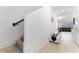 Bright entryway with stairs, tile flooring, and view to living room at 1481 Discovery St, Davenport, FL 33896