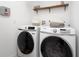 Convenient laundry room with washer and dryer at 1481 Discovery St, Davenport, FL 33896