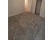 Spacious bedroom with grey carpet and closet at 1511 Woodmont Blvd, Kissimmee, FL 34746