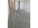 Large bedroom with grey carpet and double door closet at 1511 Woodmont Blvd, Kissimmee, FL 34746