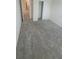 Large bedroom with grey carpet and double door closet at 1511 Woodmont Blvd, Kissimmee, FL 34746