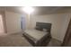 Bedroom with a bed and carpet at 1511 Woodmont Blvd, Kissimmee, FL 34746