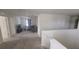 Spacious loft area with a couch and carpeting at 1511 Woodmont Blvd, Kissimmee, FL 34746