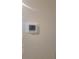 Digital thermostat on wall at 1511 Woodmont Blvd, Kissimmee, FL 34746