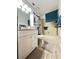 Bright bathroom with a bathtub and shower at 156 Lakewood Village Cir # 156, Daytona Beach, FL 32119