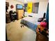 Cozy bedroom featuring a double bed and ample floor space at 156 Lakewood Village Cir # 156, Daytona Beach, FL 32119