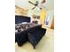 Spacious bedroom with a large bed and plush bedding at 156 Lakewood Village Cir # 156, Daytona Beach, FL 32119